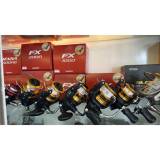 รอก Shimano FX New ( แถมเสากันล้ม ) สปูนทอง / เบอร์ 1000-4000