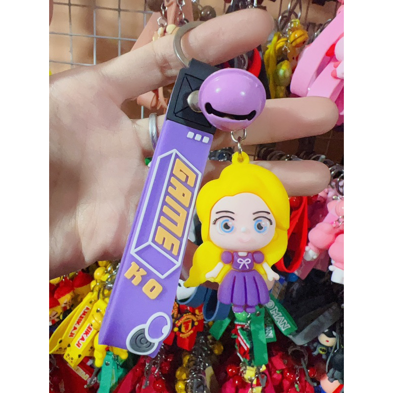 ภาพหน้าปกสินค้าNEW 50แบบ พวงกุญแจกระเป๋าใส่เหรียญลายการ์ตูนใหม่ New cartoon wallet keychain for bag YSK จากร้าน pandawin2020 บน Shopee