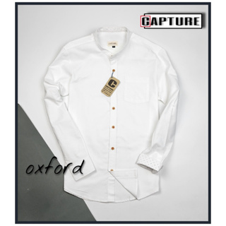 ภาพหน้าปกสินค้าเสื้อเชิ้ตแขนยาว คอจีน ผ้า Oxford สีขาว มีถึงไซส์ 4XL อก 48 นิ้ว ซึ่งคุณอาจชอบราคาและรีวิวของสินค้านี้