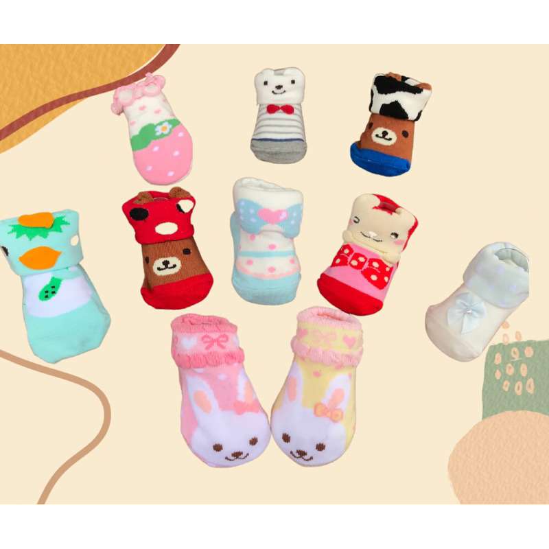 ภาพหน้าปกสินค้าถุงเท้าเด็กแรกเกิด ถุงเท้าเด็กอ่อน ลายน่ารัก จากร้าน yuiisatinee บน Shopee