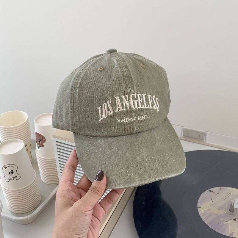 ภาพหน้าปกสินค้าส่งจากไทย หมวกเบสบอล หมวกกีฬาสี แก๊ป ปัก Los Angeles สีซีด cap สไตล์วินเทจใ มีปีก ปรับขนาดได้ มี 6 สี จากร้าน doublez123_ บน Shopee