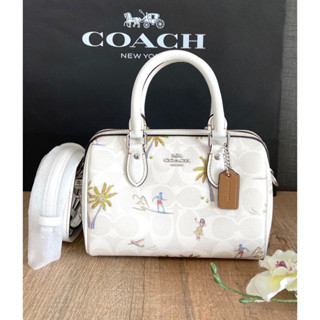 (ผ่อน0%) กระเป๋าสะพายข้าง ทรงหมอนมินิ Coach Mini Rowan Crossbody In Signature Canvas With Hula Print CK164 7 นิ้ว สีขาว