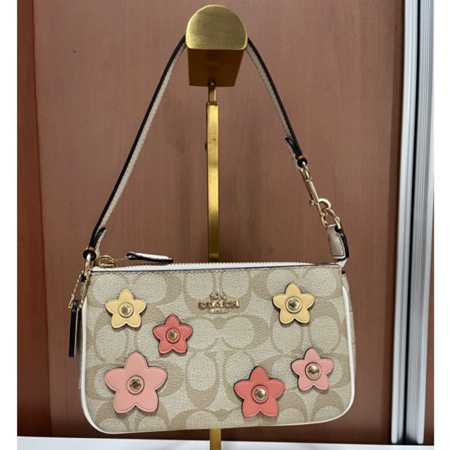 coach-nolita-19-in-signature-canvas-with-floral-applique-ch619