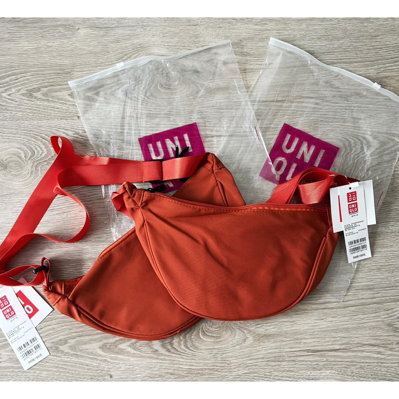 สินค้ามือหนึ่ง-uniqlo-กระเป๋าคาดอกสีส้ม