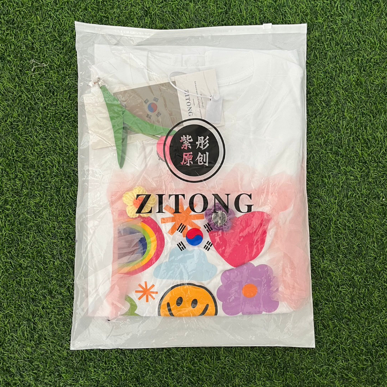 สินค้าพร้อมส่ง-เสื้อผ้านำเข้าจากเกาหลี-แบรนด์-zitong-ลายดอกไม้รูปยิ้ม-สีขาว-แฟชั่นคอกลม-รหัสay05