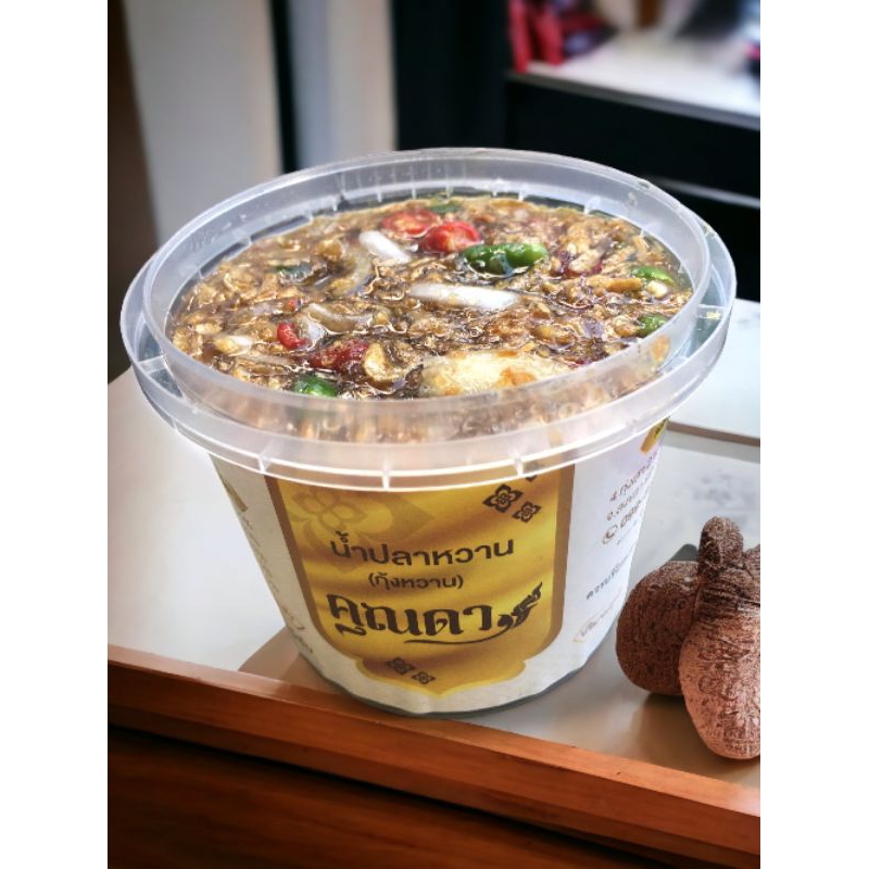 Inside The Green Spoon café with wooden tables and fresh smoothies