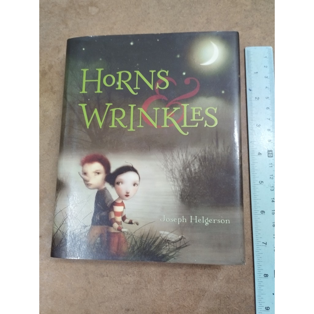 หนังสือ Horns and Wrinkles (Hardcover) by Joseph Helgerson Shopee