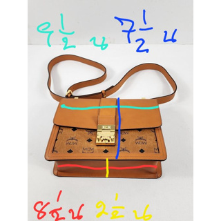 MCM Medium Tracy Visetos Shoulder Bag  Crossbody strap, 23″ drop Dimensions: 9.65″W x 3.15″D x 7″H Push-lock closure Ext