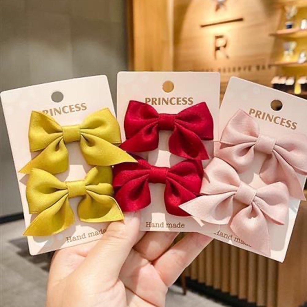 กิ๊บติดผม ประดับโบว์น่ารัก สีพื้น สไตล์เกาหลี สําหรับเด็กผู้หญิง จํานวน 2 ชิ้น