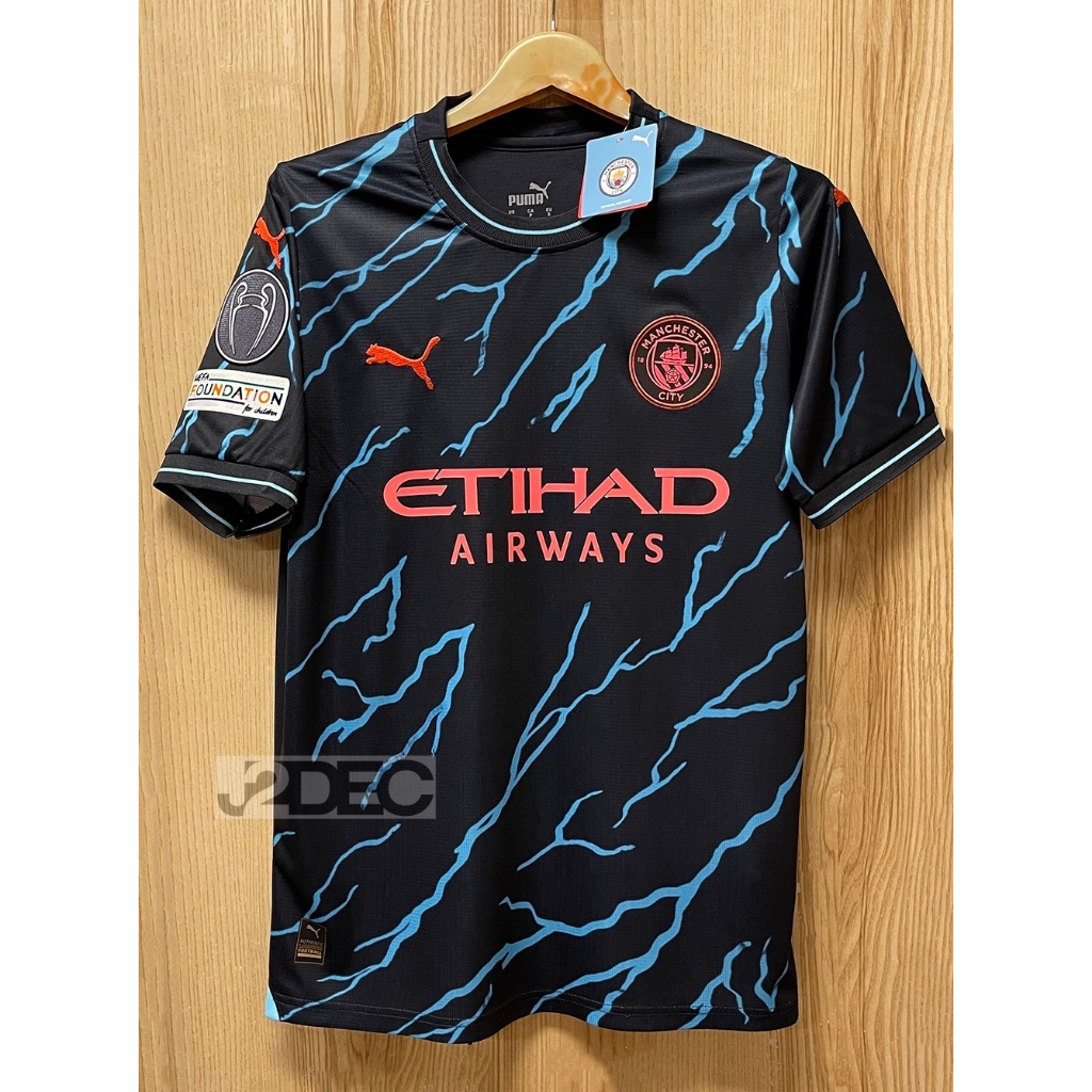 เสื้อฟุตบอล-เกรดแฟนบอล-man-city-เรือใบสีฟ้า-away-kits-3-23-24-สามารถเพิ่มชื่อนักเตะ-อาร์มepl-ได้