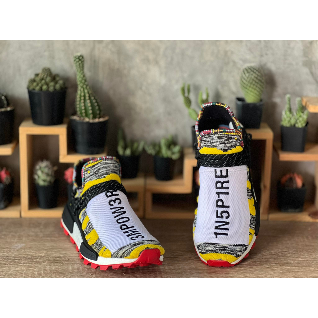 nmd hu pharrell solar pack red