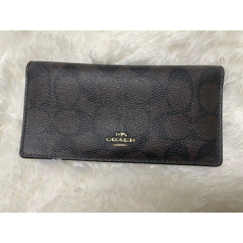 กระเป๋าเงินใบยาว coach แท้ พร้อม care card | Shopee Thailand