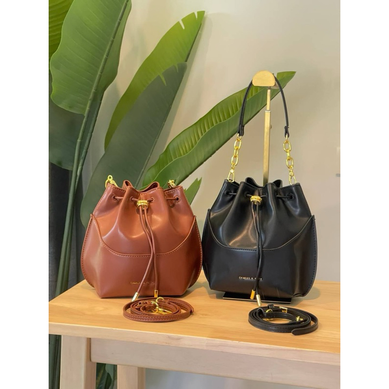 กระเป๋าทรงขนมจีบ วัสดุหนังpu | Shopee Thailand