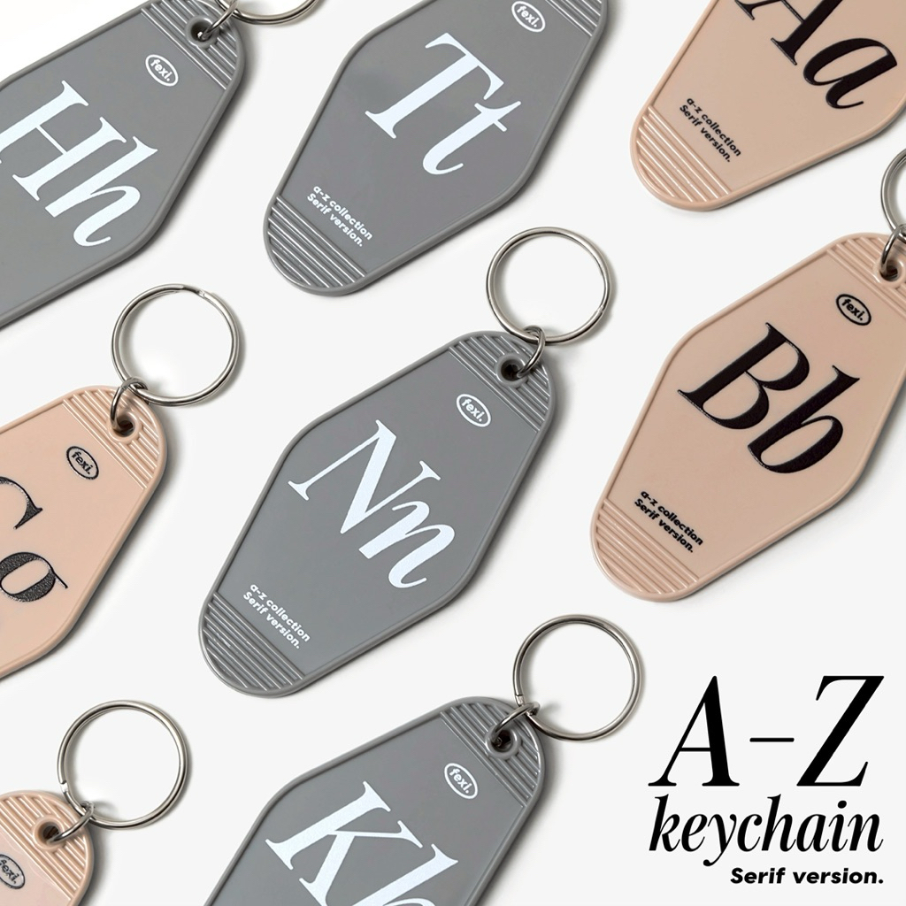 พวงกุญแจ A-Z Keychain Serif version สีเบจ/สีเทา | Shopee Thailand
