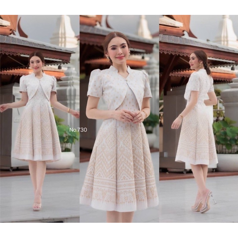 เดรสผ้าไทยสีขาวงาช้างทรงกั๊กแต่งโบว์ไหล่ ลายเทียนหยด สวยหรู พร้อมส่ง มุมมองที่ 2