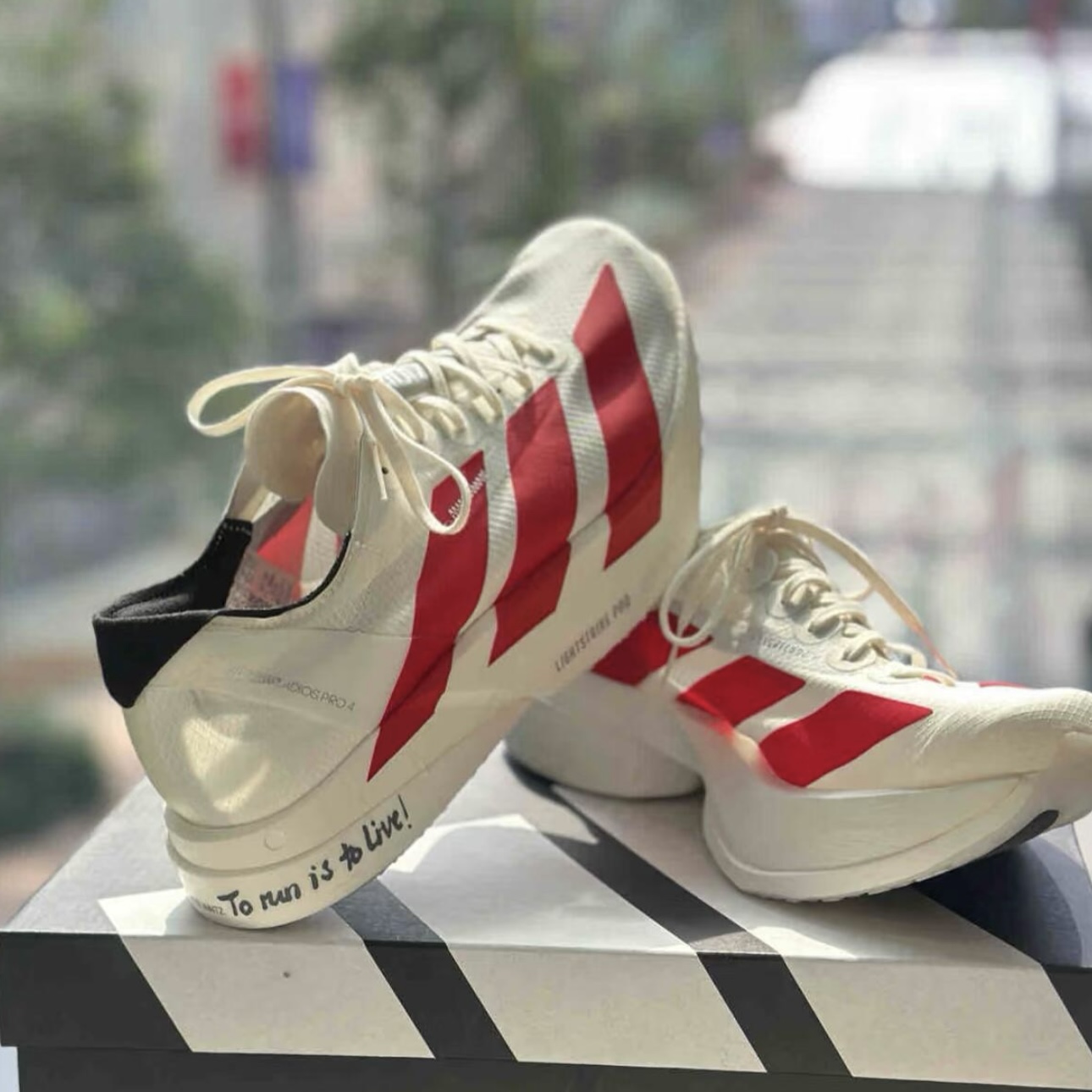รองเท้า adidas Adizero Adios Pro 4 พร้อมส่ง (JR6354) รองเท้าผ้าใบ สุด ...