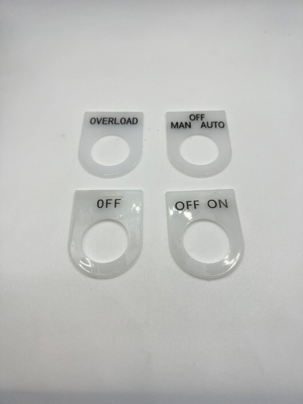 ป้ายเนมเพลท ตู้คอนโทรล ขนาด22มิล MAN OFF AUTO , OFF ON ,OFF , OVERLOAD ...