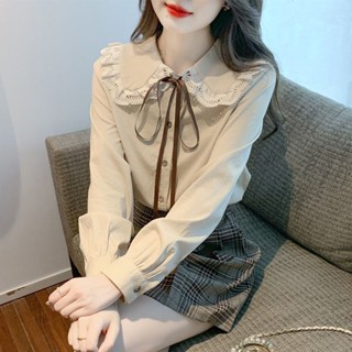 พร้อมส่ง✨ เวอร์ชั่นเกาหลี ใส่สบาย ครีม คอตุ๊กตา เสื้อผูกโบว์ แฟชั่นน่ารัก สไตล์กระโหลก ผูกครุย เสื้อแขนยาว สีพื้น มี 2 ส